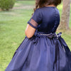 Girls' navy satin dress with bodice and bow