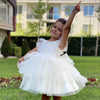 Girl's white dress with pearl beads